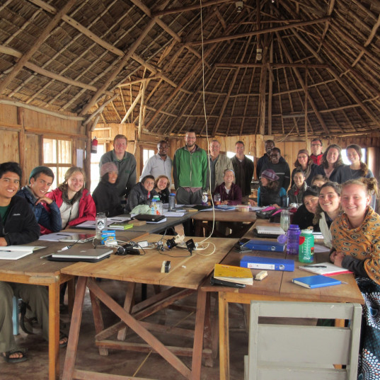 Students on an overseas trip smiling at the camera