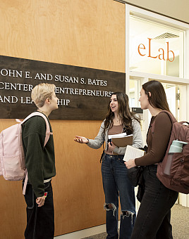 Students talking outside the Bates Center.