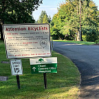 Attention Bicyclists River View Signage