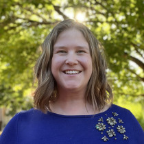 Photo of Chelsea Ellis with tree in background