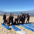 Surfers posing on the sand