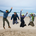 Jumping for joy on the beach