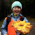 Excited to show off a giant mushroom