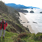 Picture shows student with Oregon Coast behind.