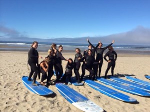 Surfers posing on the sand