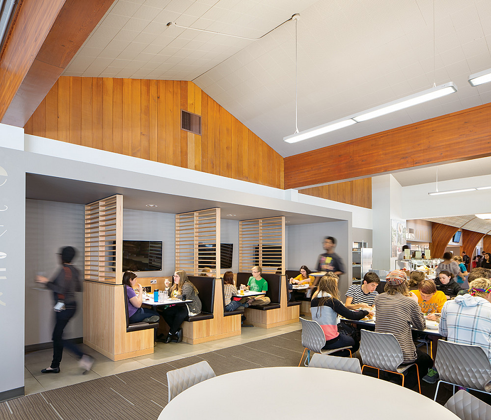 Booths, complete with Apple TVs, offer cozy meeting spaces.
