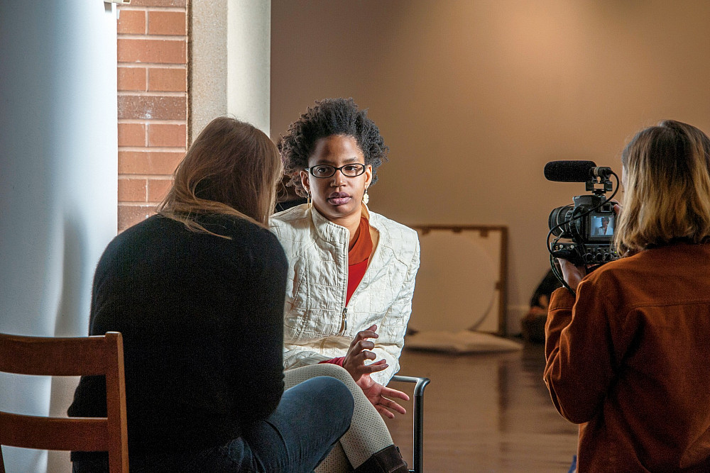Artist Susana Pilar Delahante Matienzo interfacing with local media.