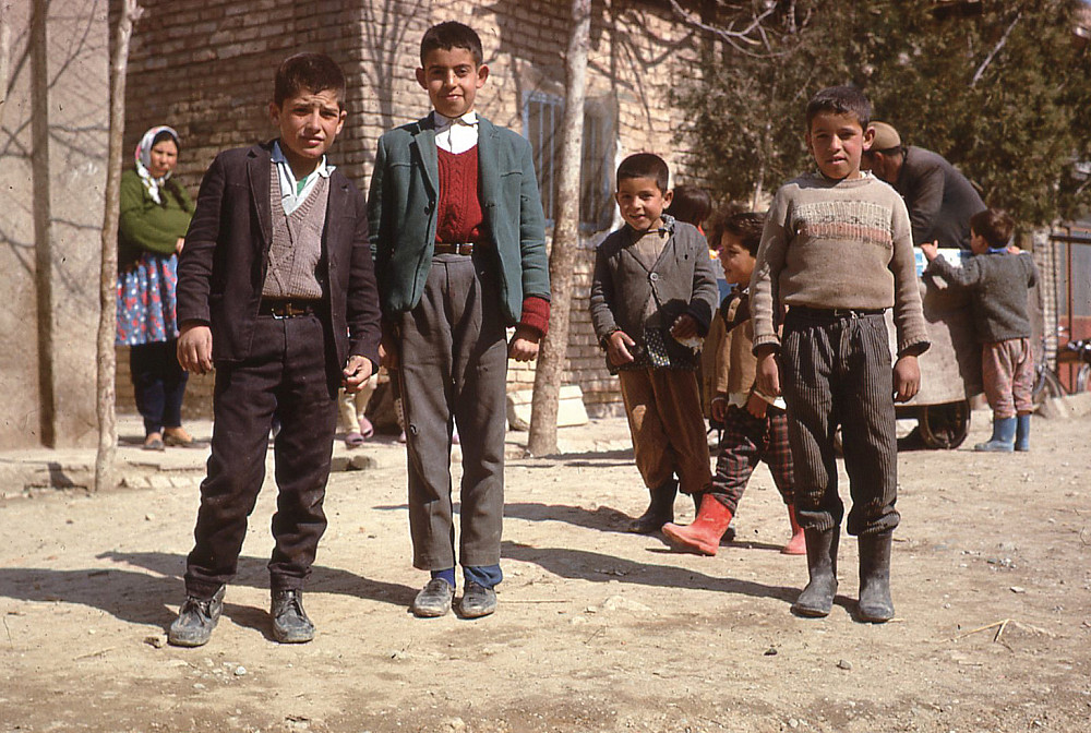 1968: Village boys show interest in their American visitors.
