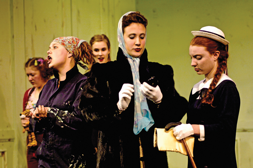 Performing a scene from Tartuffe are (foreground) Hannah Stafford '07, Heather Morowitz '09, and Claire Rogers '09, with (background) May...