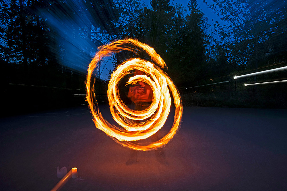 Sri Sundaresan BA '27 creates a mesmerizing arc of fire during a practice session of Fire Arts, one of L&C's 100-plus stude...