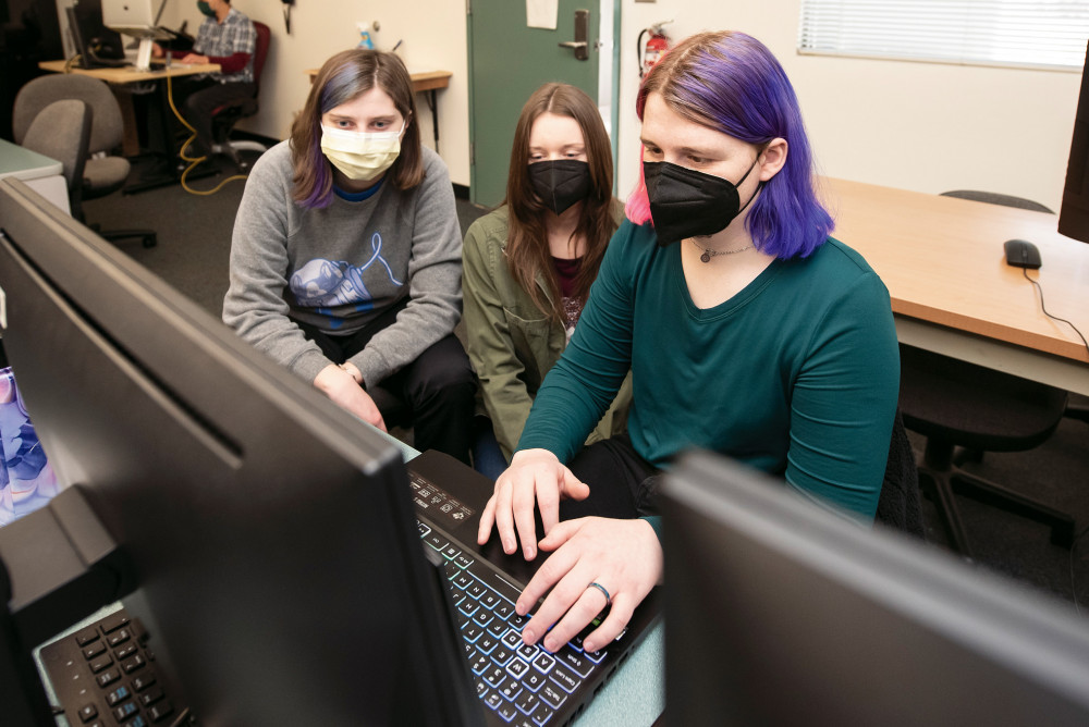 Elaine Kinsey BS '23, Sylvia Kunz BA '23, and Skye Russ BA '23