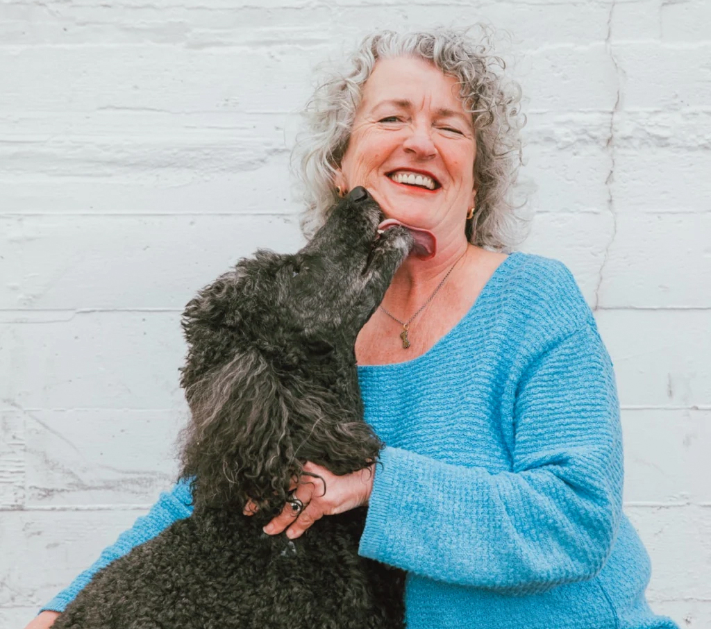 Katie McCarron with her poodle, Rosie, the inspiration for her thriving business, Portland Pet Food Company.