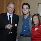 Marc Casto (center) with his mother, Maryles Casto, and Fabio Castellotto, manager of Casto Vacations.