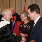 Upon receiving his honorary degree from Lewis & Clark, Shelby Davis is congratulated by Vice President and Provost Jane Atkinson and ...
