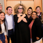 Ruth Carter demonstrates the Wakanda salute from the movie Black Panther with L&C's Inclusion and Multicultural Engagement (IME) staf...