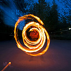 Sri Sundaresan BA '27 creates a mesmerizing arc of fire during a practice session of Fire Arts, one of L&C's 100-plus stude...