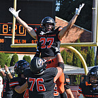 Jordan Lahusky BA '26 celebrates scoring a touchdown.