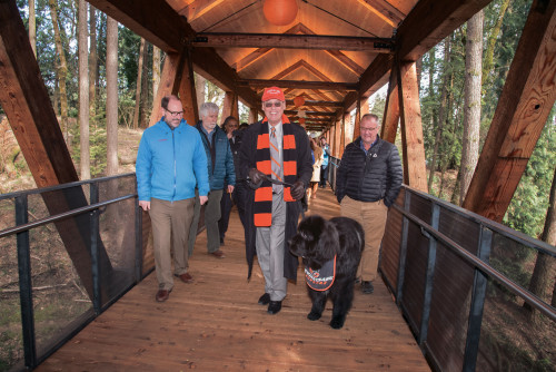 President Wiewel celebrates the opening of the new ravine bridge.