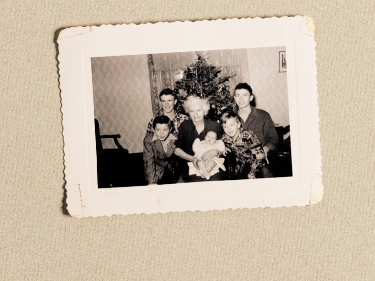 The Sack brothers are shown here in the early 1950s with their maternal grandmother, Lutie Hyink, and their baby sister, Kathy.