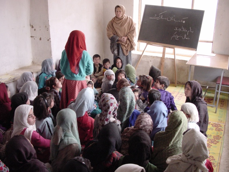 In small village schools such as this one, established by CARE in Shakardara, just north of Kabul, girls have the opportunity to receive ...