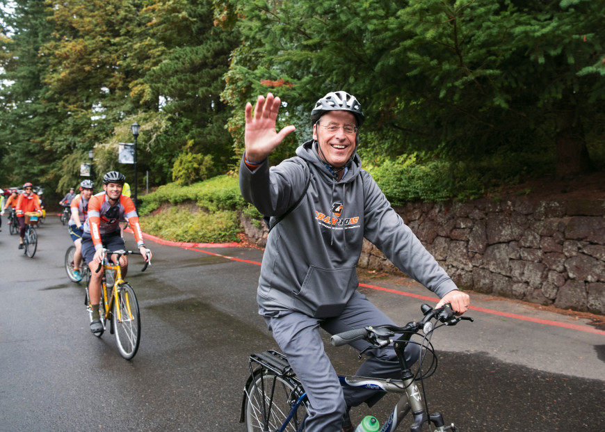 President Wiewel bikes to campus on his first day on the job.