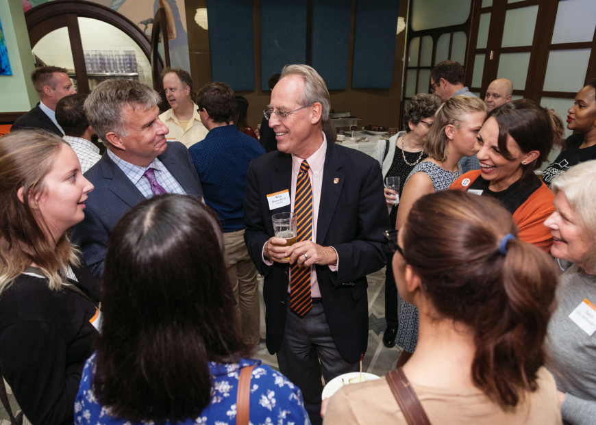 President Wiewel mingles with guests at an alumni event in Washington, D.C.