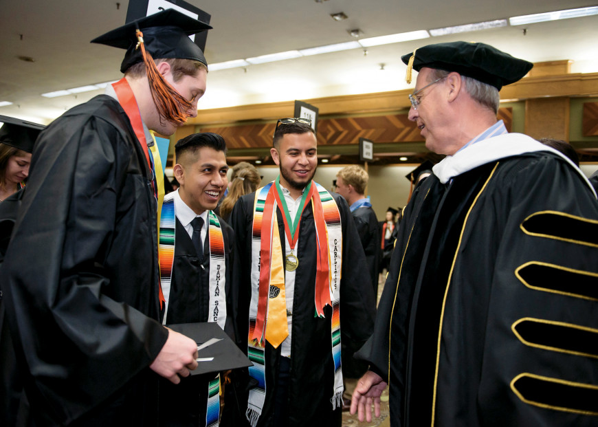 President Wiewel congratulates new L&C graduates.