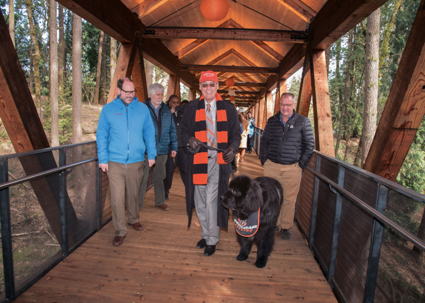 President Wiewel celebrates the opening of the new ravine bridge.