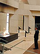 Levinger pauses for a moment of contemplation in the Hall of Remembrance at the Holocaust Museum.
