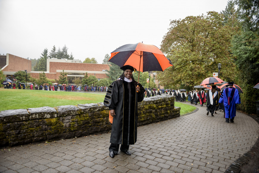 President Holmes-Sullivan didn't let a little rain ruin her day!