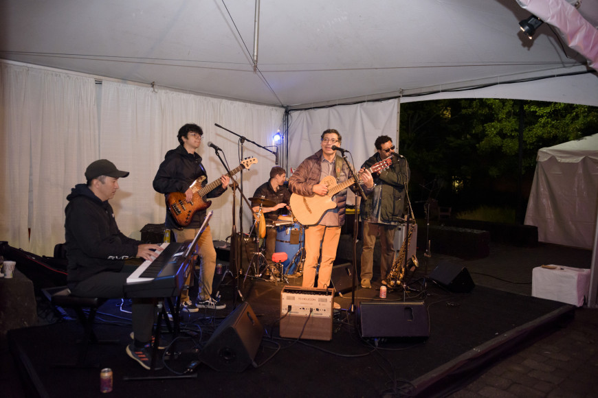 Associate Professor of Hispanic Studies Freddy Vilches performed at the reception.