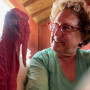Professor Tischler and Pistachio, one of her turkey boyfriends at Animal Place sanctuary.