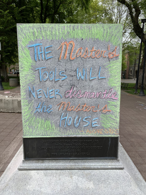 LC Art for Social Change members Mary Andrus, Liv Siulagi, Lawrence Siulagi and Beth Ann Short draw with colored chalk at Shemanski Park ...