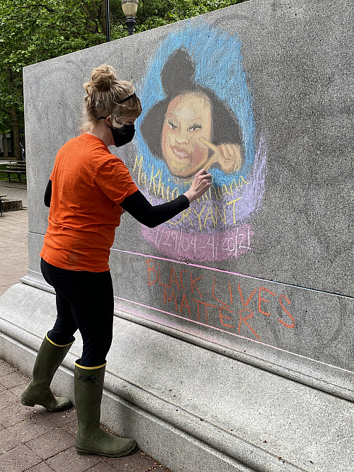 LC Art for Social Change members Mary Andrus, Liv Siulagi, Lawrence Siulagi and Beth Ann Short draw with colored chalk at Shemanski Park ...