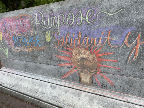 LC Art for Social Change members Mary Andrus, Liv Siulagi, Lawrence Siulagi and Beth Ann Short draw with colored chalk at Shemanski Park ...