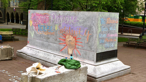 LC Art for Social Change members Mary Andrus, Liv Siulagi, Lawrence Siulagi and Beth Ann Short draw with colored chalk at Shemanski Park ...