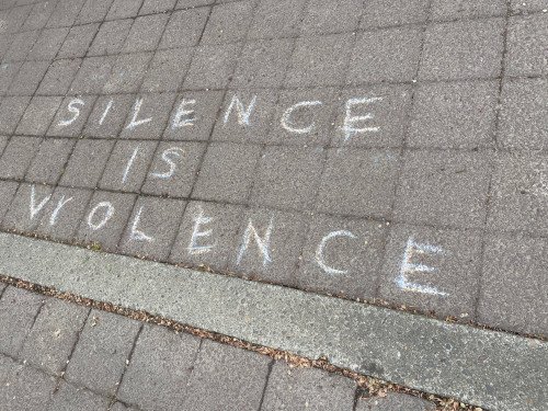 LC Art for Social Change members Mary Andrus, Liv Siulagi, Lawrence Siulagi and Beth Ann Short draw with colored chalk at Shemanski Park ...