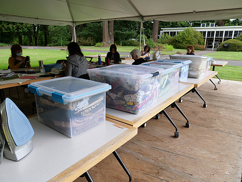 So many containers of fabric.