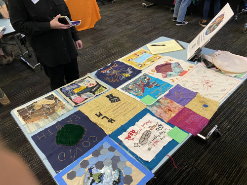 Art for Social Change displayed their quilt squares from the Pandemic Quilt