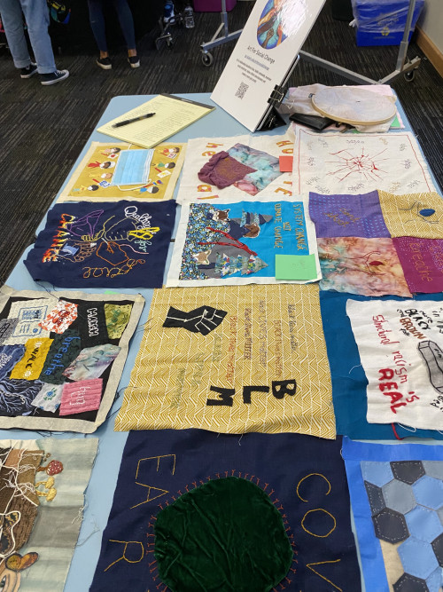 Art for Social Change displayed their quilt squares from the Pandemic Quilt