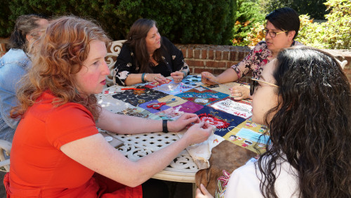 Members of Art for Social Change met to work on the Pandemic Quilt