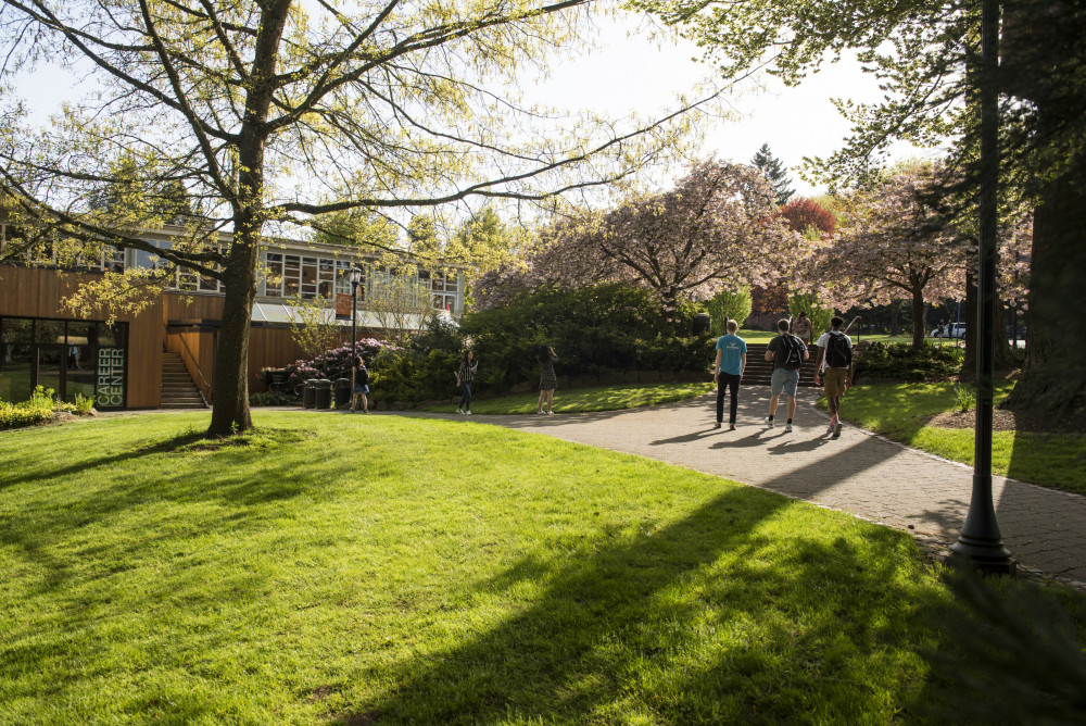 Students walking on undergraduate campus near the Career Center.