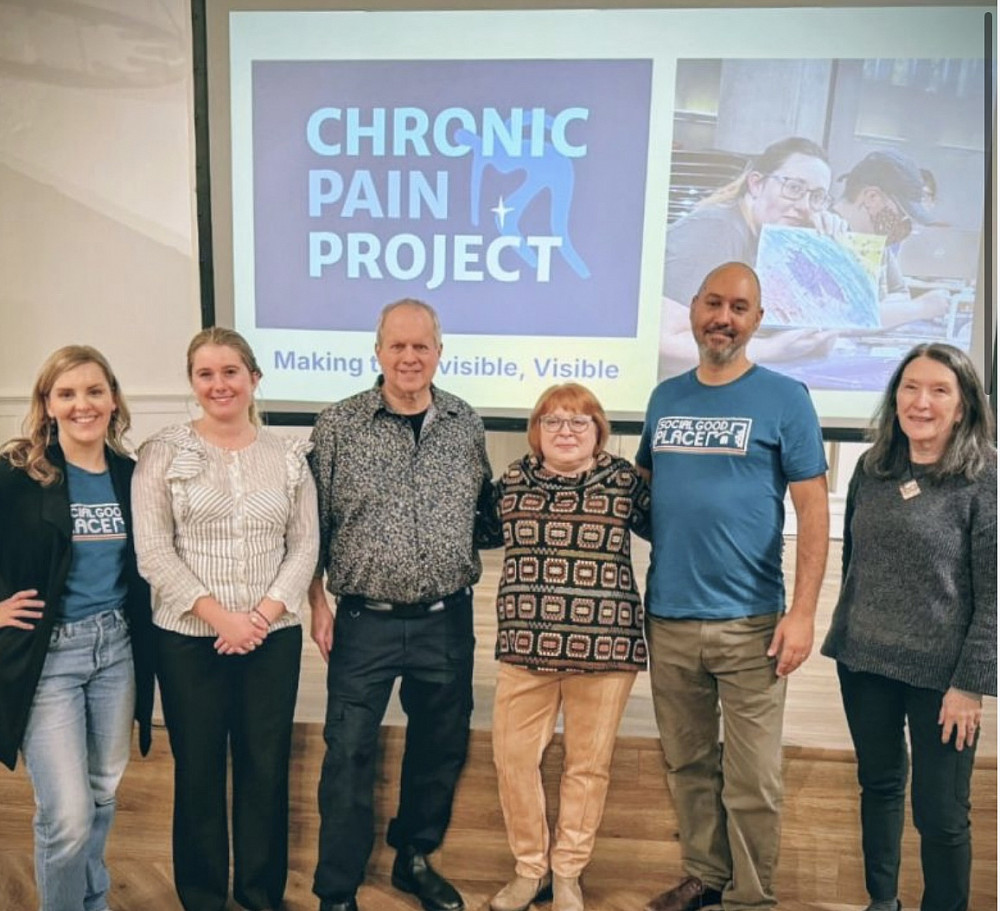 Sienna Morell-Grant BA '26 (second from the left) with Chronic Pain Project staff.