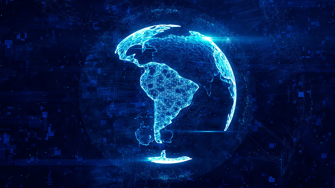 Planet Earth showing countries in glowing blue color to represent digital information.