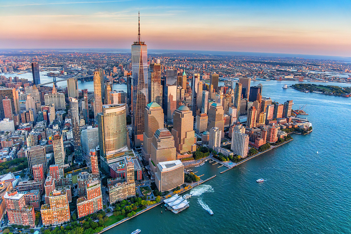 The skyline of Lower Manhattan, New York City, shot via helicopter from an altitude of about 1100 feet over New York Harbor.