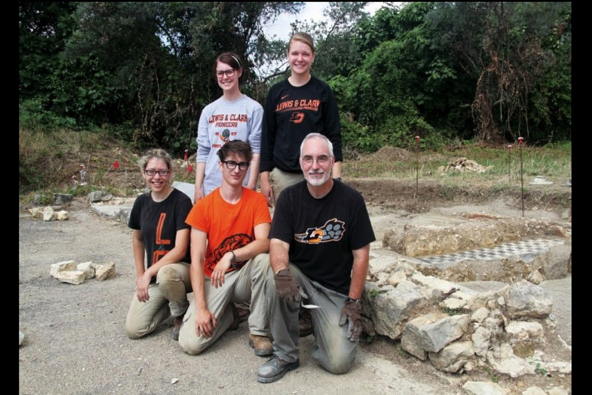 Professor Kelly with students at an archeological dig site in Italy in 2014.