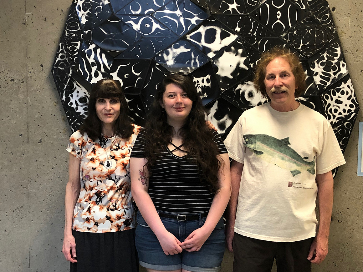 Physics professor Bethe Scaletter with Cyan Cowap BA '19 and James Abney.