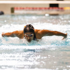 Aniqah Gaffoor BA '26 competing in the Northwest Conference Championship meet.