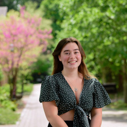 Lucia Sheridan smiles outside