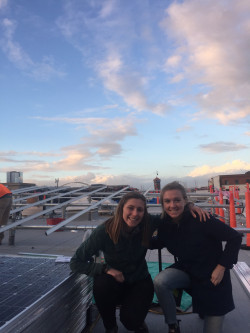 Franny and Kori on the roof of the Sally McCracken Building in Portland.